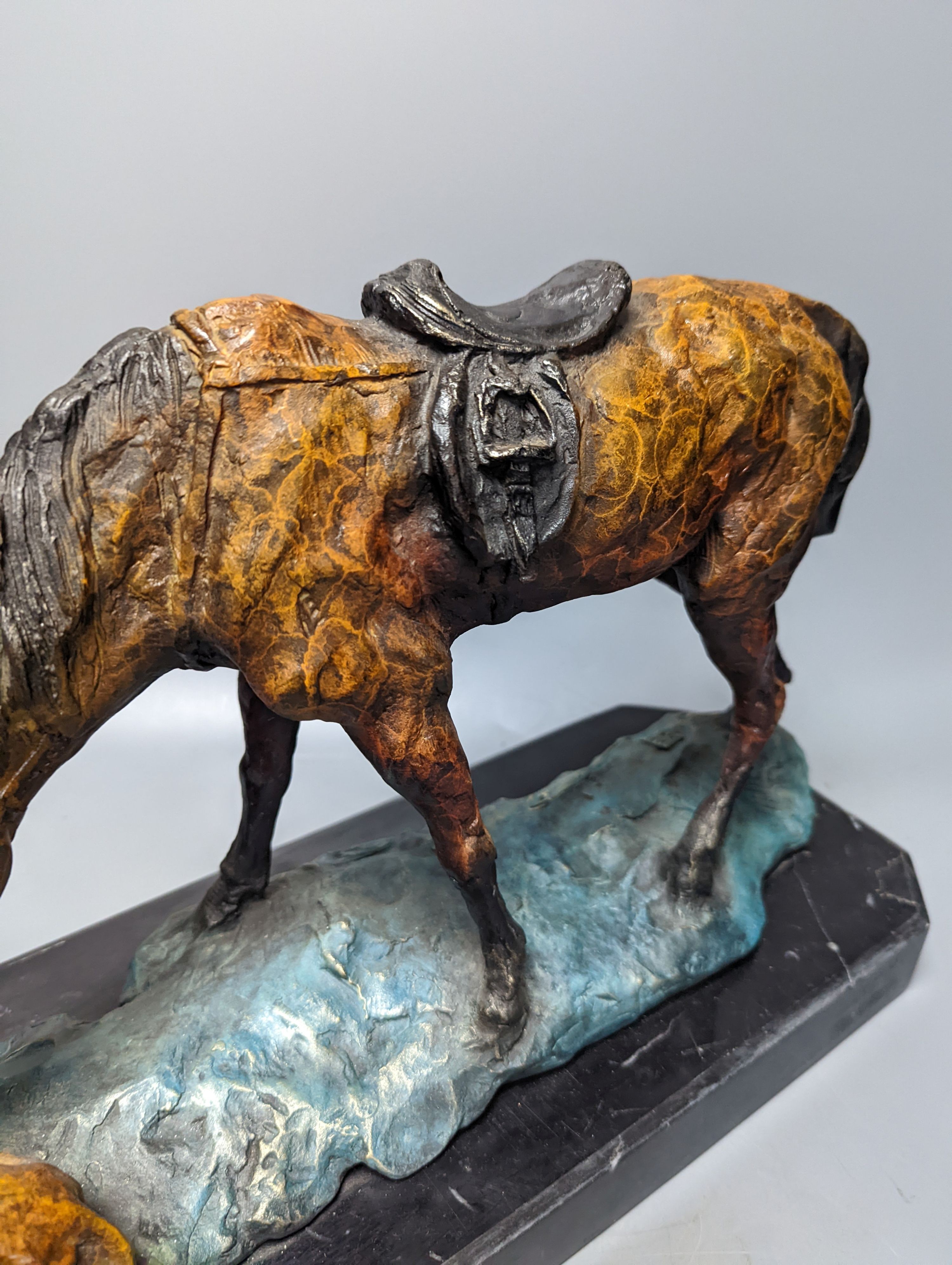A contemporary cold-painted metal horse on marble base 43cm
